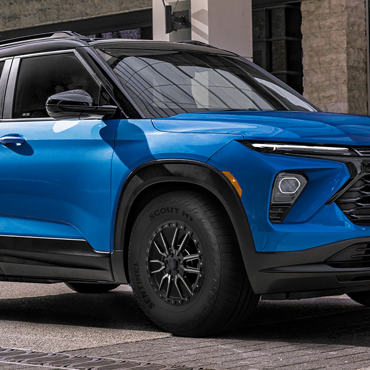 Blue SUV fitted with Sentinel Scout HT tires