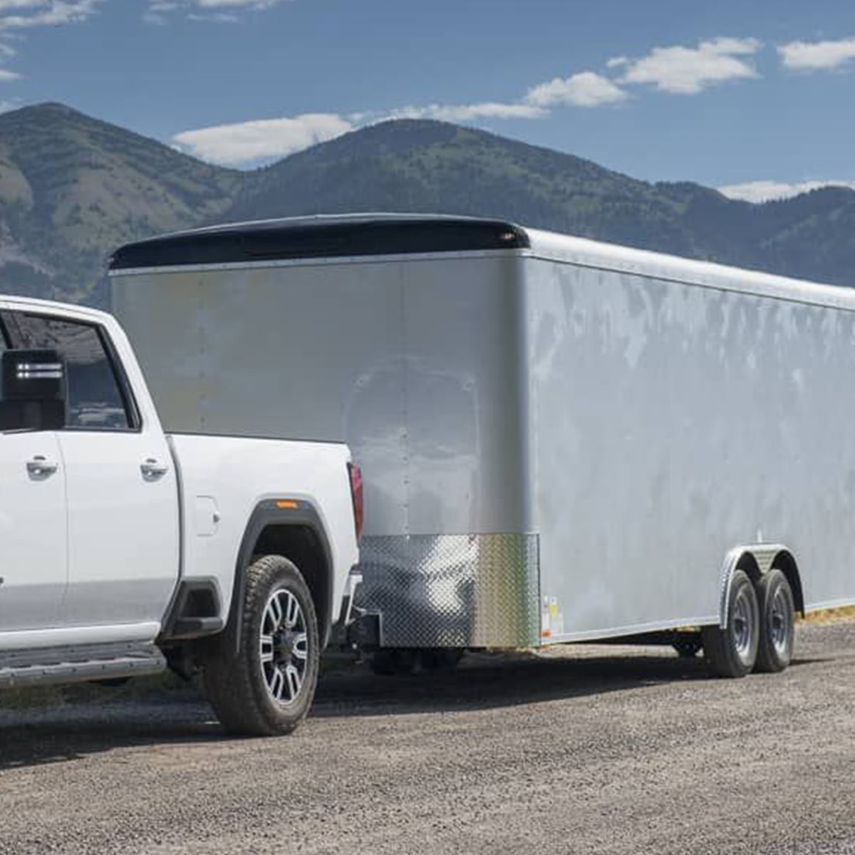 Enclosed trailer being towed on an open road
