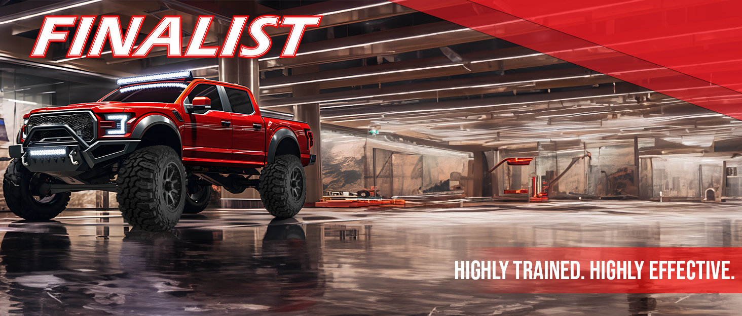 Red pickup truck driving on a dirt road with Finalist Terreno A/T tires
